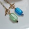 Collier Alia pendentif bleu et or - Bijou créateur