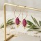 Boucles d'oreilles acier inoxydable prune et dorées 