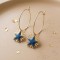 Boucles d'oreilles acier inoxydable bleu marine doré soleil etoile