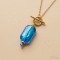 Collier Alia pendentif bleu et or - Bijou créateur