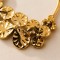 Collier long bohème chic doré à pendentif floral