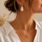 Boucles d'oreilles bohème chic goutte ivoire