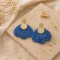Boucles d'oreilles bohème chic bleues en résine marbrée