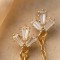 Boucles d'oreilles pendantes dorées zircons & médaille martelée