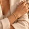Bracelet jonc torsadé doré en acier inoxydable "Ondine" - Bijou bohème chic