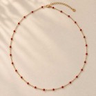 Collier fin petites perles rouge doré 