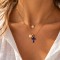 Collier croix bleu doré