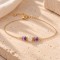 Bracelet améthyste et pierre de lune doré