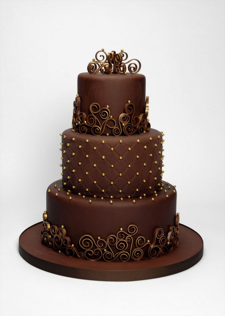 wedding cake idées mariage ivoire chocolat perle or volutes